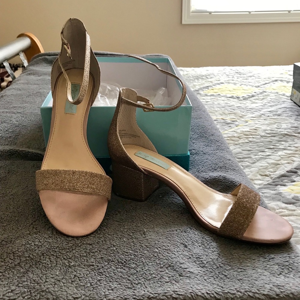 Rose gold glitter block heels.